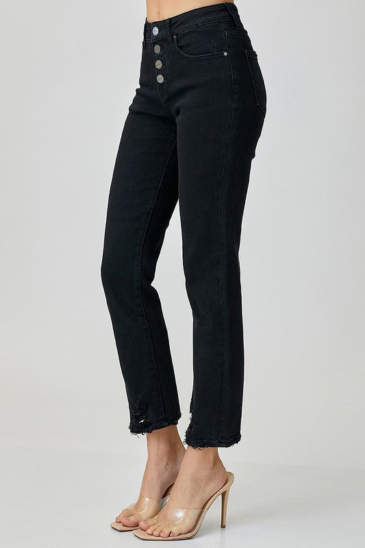 RISEN WOMAN IN BLACK JEANS