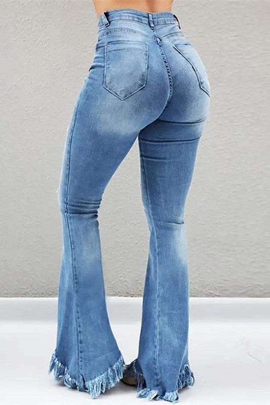 BeBe Bell Bottom Distressed Tassel Jeans